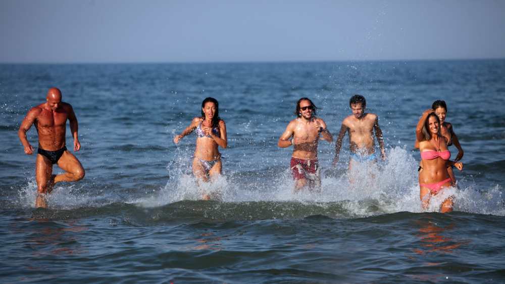 bagnanti in acqua, Rimini foto di PH. Paritani