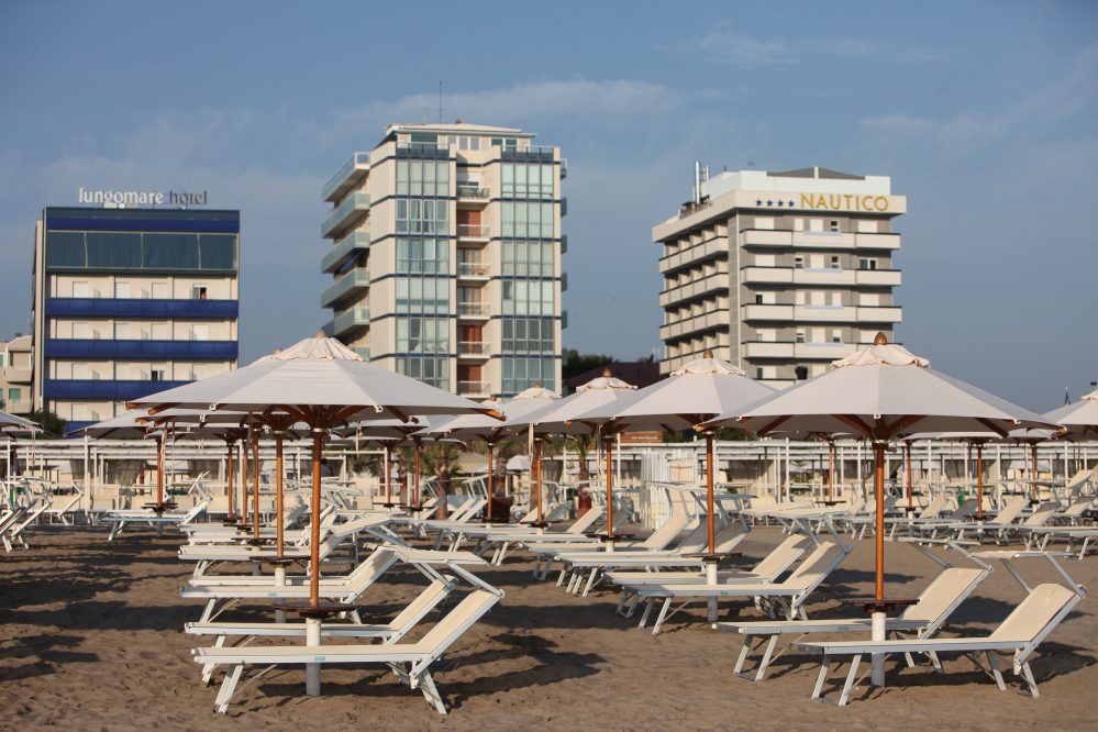 beach and sun umbrellas, Riccione photo by PH. Paritani