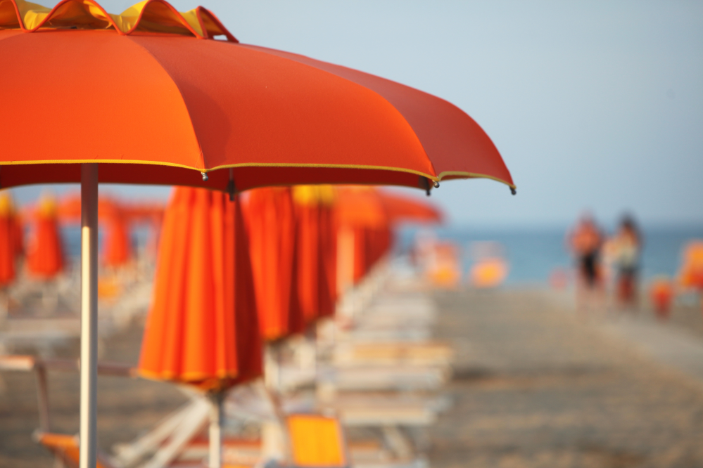 Rimini beach and sun umbrellas photo by PH. Paritani