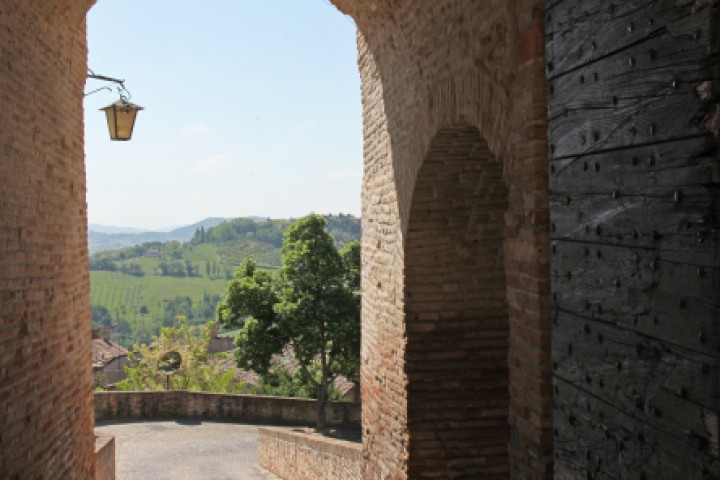 Entrance gate to Montegridolfo photo by PH. Paritani