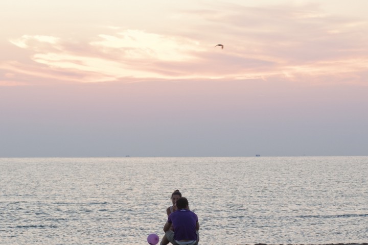 La Notte Rosa - The Pink Night, young people on the beach photo by R. Gallini